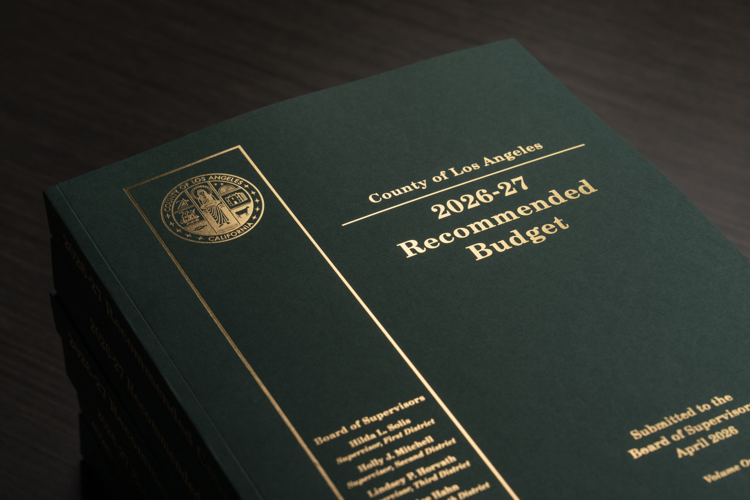 Los Angeles County's 2026-27 Recommended Budget book cover on desk