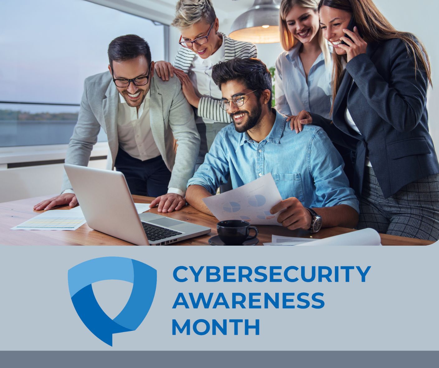 A diverse group of professionals collaborates on cybersecurity awareness strategies at a modern workspace.